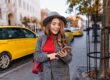Lady using phone to book cab