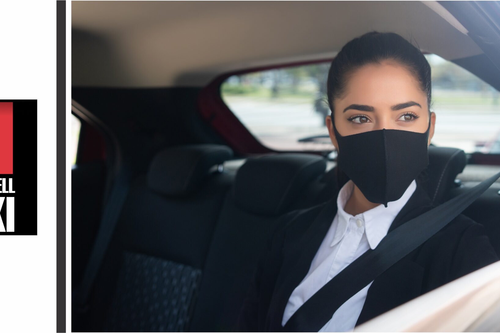 lady in A1 Bracknell taxi looking outside - best business taxi service
