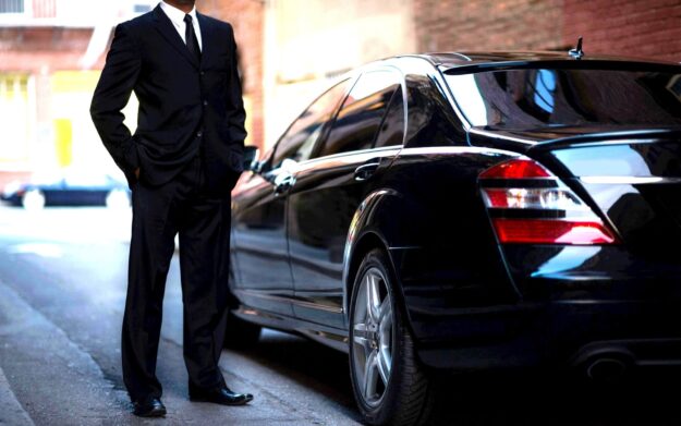Reliable Private Hire Company A1 Bracknell Taxi services Chauffeur driver waiting for customer - Reliable Private Hire Company